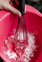 Child having fun modeling salt dough, authentic activity with natural pink coloring beet juice, fine motor skills development photo