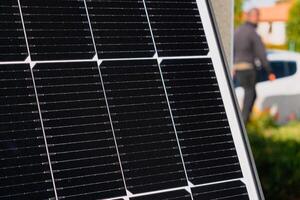 Solar panels on a well-exposed wall of an individual house, making savings following the energy crisis, eco-citizen gesture, green energy photo