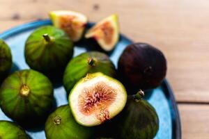 Fig fruits on a plate, ficus carica photo