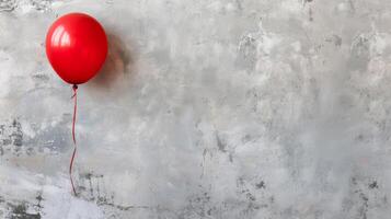 AI generated Minimalistic light gray background with one red balloon on the left with large copyspace area photo