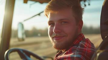 ai generado joven hermoso tractor conductor mira a el cámara y sonrisas foto