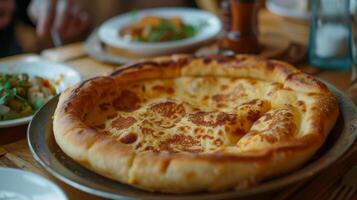 AI generated Delicious warm Adjarian-style khachapuri on a plate in a Georgian restaurant photo