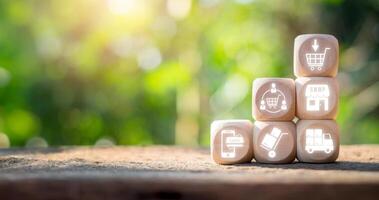 Shopping and delivery concept, Wooden block on desk with shopping and delivery icon on virtual screen. photo