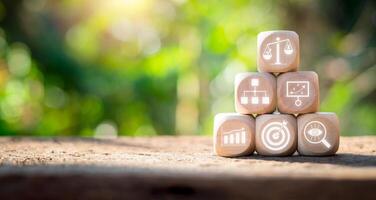 Balanced Scorecard concept, Wooden block on desk with balanced Scorecard icon on virtual screen. photo