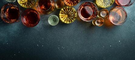 Selection of hard strong alcoholic drinks. Alcoholic drinks in glasses. Alcohol banner. photo