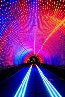 AI generated A tunnel with a heart-shaped neon light at the end, surrounded by a circular neon frame. ai generative photo
