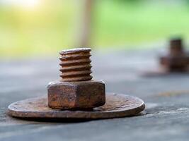 Old wooden panels with bolts and screws. photo