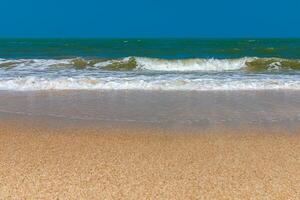 White wave on the beach at Andaman sea photo