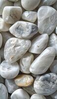 AI generated white pebbles, in the style of smooth and polished, monochromatic hues, poured resin, duckcore photo