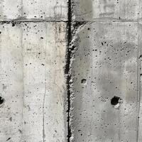 AI generated A close-up of weathered concrete surfaces, capturing the raw beauty of this minimalist material photo