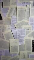 Background of stack of various waste paper vertically video