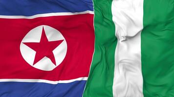 North Korea and Nigeria Flags Together Seamless Looping Background, Looped Bump Texture Cloth Waving Slow Motion, 3D Rendering video