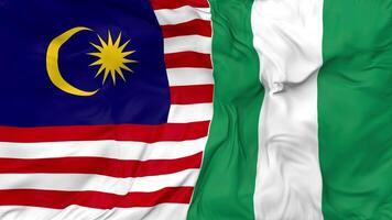 Maleisië en Nigeria vlaggen samen naadloos looping achtergrond, lusvormige buil structuur kleding golvend langzaam beweging, 3d renderen video