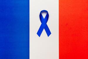 Dark blue ribbon awareness for aids day concept. France world organization. photo