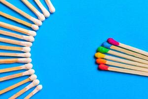 The concept of diversity and inclusiveness. Multicolored matches. photo