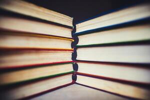 Background of multicolored roots of old books. selective focus. Copy space. photo