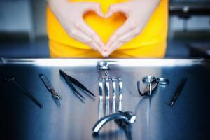 Medical background. surgical instruments. The concept of love of medicine. Surgeon with heart. photo