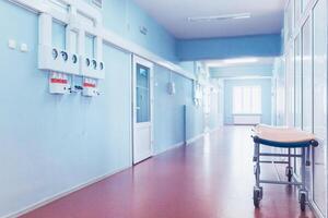 Medical concept. Hospital corridor with rooms. photo