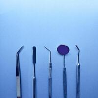 Dentist tools. Teethcare, dental health concept. photo