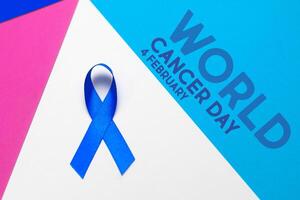 mundo cáncer día concepto antecedentes. azul cinta foto