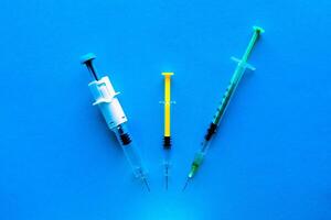 set of syringes. concept of vaccination of people and animals photo