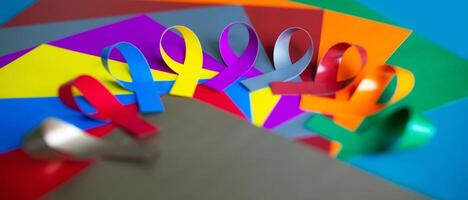 World cancer day background. Colorful ribbons, cancer awareness. multi-colored surface. International Agency for Research on Cancer photo