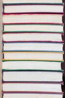 Background of multicolored roots of old books. Copy space. photo