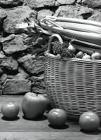 black and white photograph of vegetables in a basket photo