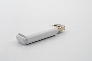 USB flash drive, USB Type-A connector, designed for portability. Commonly used for personal data transport and backup. Data exchange, compatible with multiple operating systems, plug-and-play device. photo