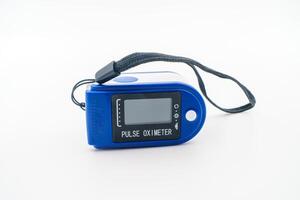 Medical pulse oximeter with an LCD. Assessment of blood oxygen saturation SpO2, heart and pulse rate, crucial in patient health monitoring, emergencies. COVID-19 Medical monitoring device pandemic photo