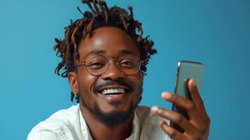 AI Generated An African American millennial in casual wear with glasses, using a modern cellphone, looking at the camera with excitement. photo