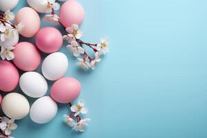 AI generated Top view colorful easter egg with cherry blossom on blue background, copy space, generative Al. photo