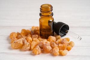 Frankincense or olibanum aromatic resin isolated on white background used in incense and perfumes. photo