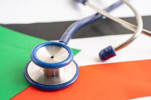 Stethoscope on Palestine flag background, Business and finance concept. photo