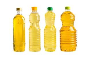 Vegetable oil with olive oil in different bottle for cooking isolated on white background with clipping path. photo