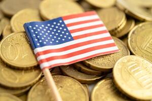 US flag on coins money, finance and accounting, banking concept. photo