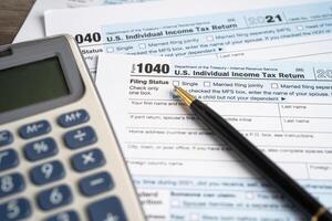 Form 1040, U.S. Individual Income Tax Return, tax forms in the U.S. tax system. photo