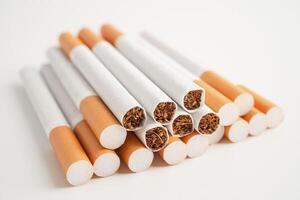 Cigarette, tobacco in roll paper with filter tube, No smoking concept. photo