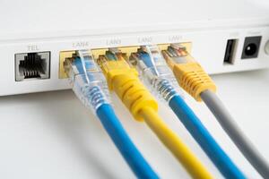 Ethernet cable with wireless router connect to internet service provider internet network. photo