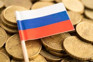 Russia flag on coins money, finance and accounting, banking. photo