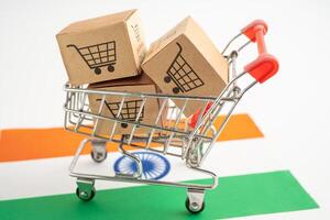 Box with shopping online cart logo and India flag, Import Export Shopping online or commerce finance delivery service store product shipping, trade, supplier. photo