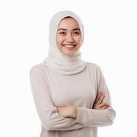 AI generated Radiant Asian Muslim woman in a cream sweater, expressing a joyful Eid Mubarak greeting gesture, isolated on a clean white background, capturing the essence of a religious lifestyle photo