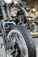 Front Fork Of Classic Motorcycle With Whitewall Tire photo