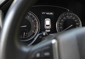 Activated park pilot system shows the distance to the object behind the car photo