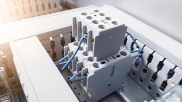 Electrical Magnetic Contactor relay on the circuit control machine. photo
