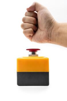 Stop Button and the Hand of Worker About to Press it. emergency stop button. Big Red emergency button or stop button for manual pressing. isolated on white background. photo