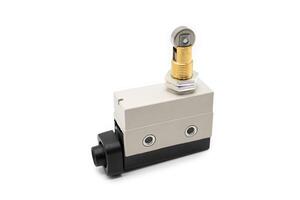 Limit switch sensor of the machine. limit switch for mechanical movement and actuators limits. isolated on white background of limit switch, control device, electrical equipment in control system. photo