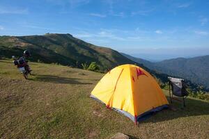 Traveling by motorcycle, camping trip at Doi Soi Malai National Park, Thailand photo