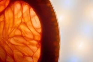 Macro texture of juicy grapefruit with abstract elements photo