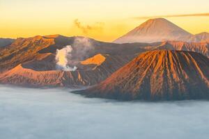 Spectacular view of Mount Bromo at dawn. This is an active volcano part of the Tengger massif, in East Java, Indonesia. photo